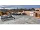 Spacious rooftop patio with outdoor kitchen, lounge area, grill and scenic mountain views at 10238 E Rising Sun Dr, Scottsdale, AZ 85262