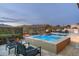 Beautiful pool and spa with scenic desert landscape views and lounge seating available at 10238 E Rising Sun Dr, Scottsdale, AZ 85262