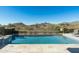 Refreshing swimming pool with desert views, surrounded by a tiled patio, perfect for enjoying the outdoors at 10238 E Rising Sun Dr, Scottsdale, AZ 85262