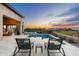 Luxurious pool and spa area with comfortable lounge chairs and stunning sunset views at 10238 E Rising Sun Dr, Scottsdale, AZ 85262