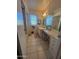 This bathroom features a double vanity and window at 10402 N Balboa Dr, Sun City, AZ 85351
