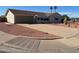 Charming single story home with mature landscaping and a circular driveway at 10402 N Balboa Dr, Sun City, AZ 85351
