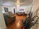 Spacious living room with hardwood floors, ceiling fan and comfortable furnishings at 10402 N Balboa Dr, Sun City, AZ 85351