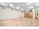 Large bonus room with lots of light, wooden floors and built in cabinets at 10935 E Grandview Way, Scottsdale, AZ 85255