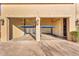 Dual garages showcasing car lifts, providing extra parking at 10935 E Grandview Way, Scottsdale, AZ 85255