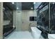 A luxurious bathroom features marble, rainfall shower, and contemporary fixtures at 11578 N 80Th Pl, Scottsdale, AZ 85260