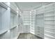 Well-organized walk-in closet featuring custom shelving at 11578 N 80Th Pl, Scottsdale, AZ 85260