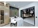 Bright kitchen features a marble island and an exterior view at 11578 N 80Th Pl, Scottsdale, AZ 85260