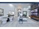 Open concept living area with modern decor, a dining space, and a grand entrance, perfect for entertaining at 11578 N 80Th Pl, Scottsdale, AZ 85260
