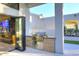 Outdoor kitchen featuring stainless steel grill and a built-in countertop perfect for al fresco dining at 11578 N 80Th Pl, Scottsdale, AZ 85260