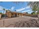 A home's exterior showing large backyard with easy care landscaping at 11844 N 146Th Ave, Surprise, AZ 85379