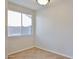 A bright room with tile floors, a window, and neutral walls at 11844 N 146Th Ave, Surprise, AZ 85379