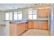 Bright kitchen with a large sink, ample counter space, and modern appliances, ideal for cooking and entertaining at 11844 N 146Th Ave, Surprise, AZ 85379