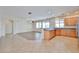A large and open space with tile floors and neutral cabinets at 11844 N 146Th Ave, Surprise, AZ 85379