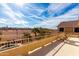 Tranquil balcony view showcasing a desert landscape, clear blue sky and a mountain range at 1213 W Deoni Trl, San Tan Valley, AZ 85143