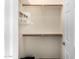 Bright, empty closet space featuring basic rod and shelf storage solutions at 1213 W Deoni Trl, San Tan Valley, AZ 85143