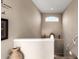 Carpeted staircase with white railing and decorative lighting with small arch window at 1213 W Deoni Trl, San Tan Valley, AZ 85143