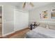 Bedroom featuring hardwood floors, natural light, and a closet at 1331 E Bates St, Mesa, AZ 85203
