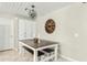 Charming dining area with farmhouse table, stylish lighting, and ample storage at 1331 E Bates St, Mesa, AZ 85203
