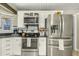 Well-appointed kitchen with stainless steel appliances and dark countertops at 1331 E Bates St, Mesa, AZ 85203