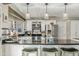 Bright kitchen featuring a spacious island, stainless steel appliances, and modern finishes at 1331 E Bates St, Mesa, AZ 85203