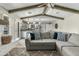 Spacious living room has exposed beams, and views to the kitchen. This home is perfect for entertaining! at 1331 E Bates St, Mesa, AZ 85203