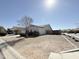 Well-kept home featuring neutral exterior and desert landscape at 1353 E Poncho Ln, San Tan Valley, AZ 85143