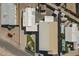 An aerial view showing the building's roof, nearby homes, landscaping, and street at 1373 E 23Rd Ave, Apache Junction, AZ 85119