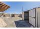 Open backyard featuring multiple storage sheds at 1373 E 23Rd Ave, Apache Junction, AZ 85119