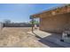 Open backyard with a concrete slab and block wall at 1373 E 23Rd Ave, Apache Junction, AZ 85119