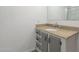 Cozy bathroom with granite countertop and a shower with glass door at 1373 E 23Rd Ave, Apache Junction, AZ 85119