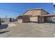 Exterior of tan building with open metal sheds, providing ample storage space at 1373 E 23Rd Ave, Apache Junction, AZ 85119