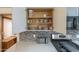 Bright kitchen features ample storage space and modern appliances including stainless steel toaster and gas range at 1373 E 23Rd Ave, Apache Junction, AZ 85119