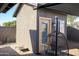 Backyard featuring a shed, patio, and comfortable seating area at 15056 N 43Rd St, Phoenix, AZ 85032