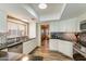 Bright kitchen with stainless steel appliances and granite countertops at 15056 N 43Rd St, Phoenix, AZ 85032