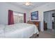 Bedroom with a large picture window allowing plenty of natural light at 15779 W Remington Dr, Surprise, AZ 85374