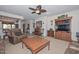 Inviting living room with warm tones and a comfortable seating arrangement at 15779 W Remington Dr, Surprise, AZ 85374