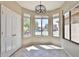 Bright breakfast nook featuring a bay window and modern light fixture, creating a cozy dining space at 16188 W Hearn Rd, Surprise, AZ 85379
