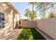 An outdoor space with artificial turf is perfect for recreation, offering low maintenance and usability at 16256 S 1St St, Phoenix, AZ 85048