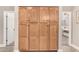 Hallway with a wall of cabinets for extra storage at 16256 S 1St St, Phoenix, AZ 85048
