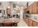 Spacious kitchen with granite countertops, stainless steel appliances, and tile backsplash at 16256 S 1St St, Phoenix, AZ 85048