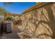 Outdoor kitchen with a built-in grill, countertops, a pergola, and ample seating for guests at 16256 S 1St St, Phoenix, AZ 85048