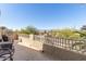 Outdoor patio with seating, and railing, offering views of the surrounding area at 16256 S 1St St, Phoenix, AZ 85048
