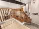 Well-lit staircase with wood banister, leading to the upper level at 16256 S 1St St, Phoenix, AZ 85048