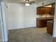 Open-concept kitchen area featuring tile flooring and modern appliances at 16635 N Cave Creek Rd # 213, Phoenix, AZ 85032