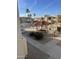 Community pool with a pergola and seating available to residents at 16635 N Cave Creek Rd # 213, Phoenix, AZ 85032