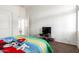 Bedroom featuring carpet floors and natural lighting at 18261 W Weatherby Dr, Surprise, AZ 85374