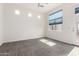 Bedroom featuring carpet floors and natural lighting through multiple windows at 18261 W Weatherby Dr, Surprise, AZ 85374