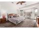 Relaxing main bedroom featuring neutral tones, soft carpet, and natural light for a serene retreat at 18261 W Weatherby Dr, Surprise, AZ 85374