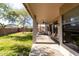 View of the covered patio with outdoor seating, perfect for relaxing and enjoying the backyard at 18261 W Weatherby Dr, Surprise, AZ 85374